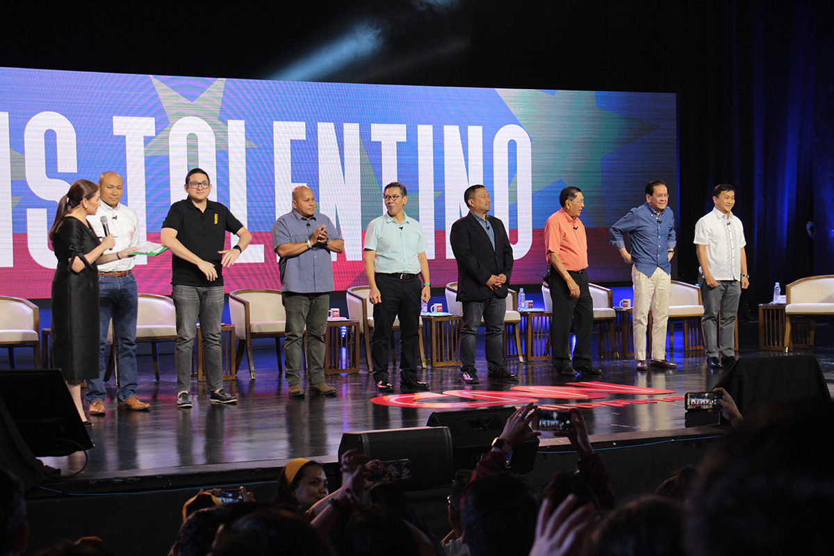 The eight senatorial candidates are introduced at the University Theater. (Photo by Jun Madrid, UP MPRO)